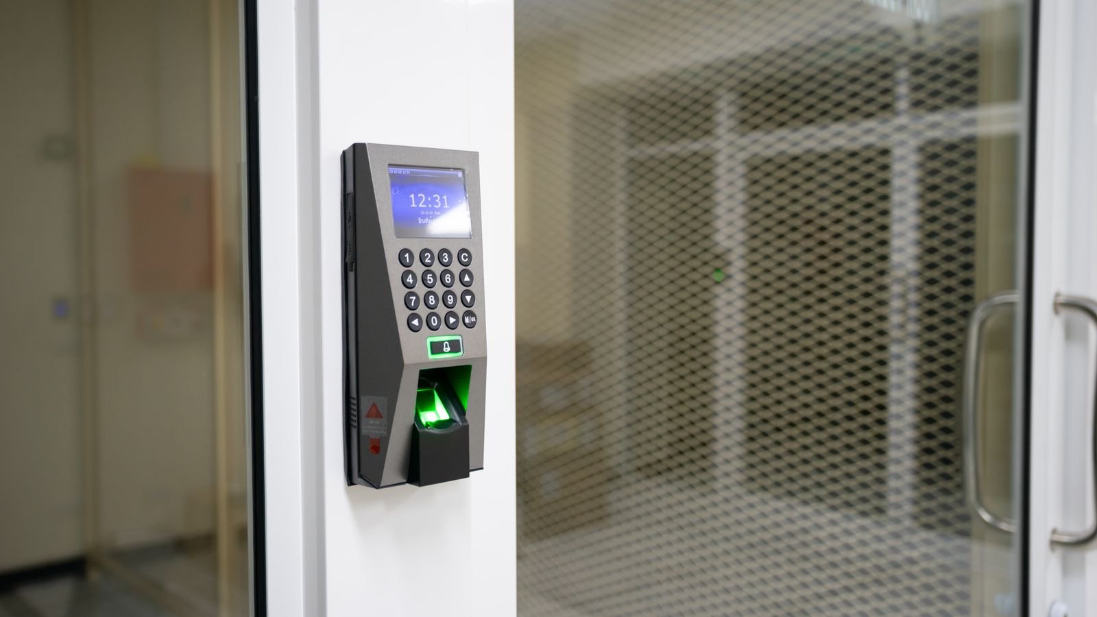 A modern fingerprint scanner used for secure access control, representing precision biotechnology and AI-driven drug discovery