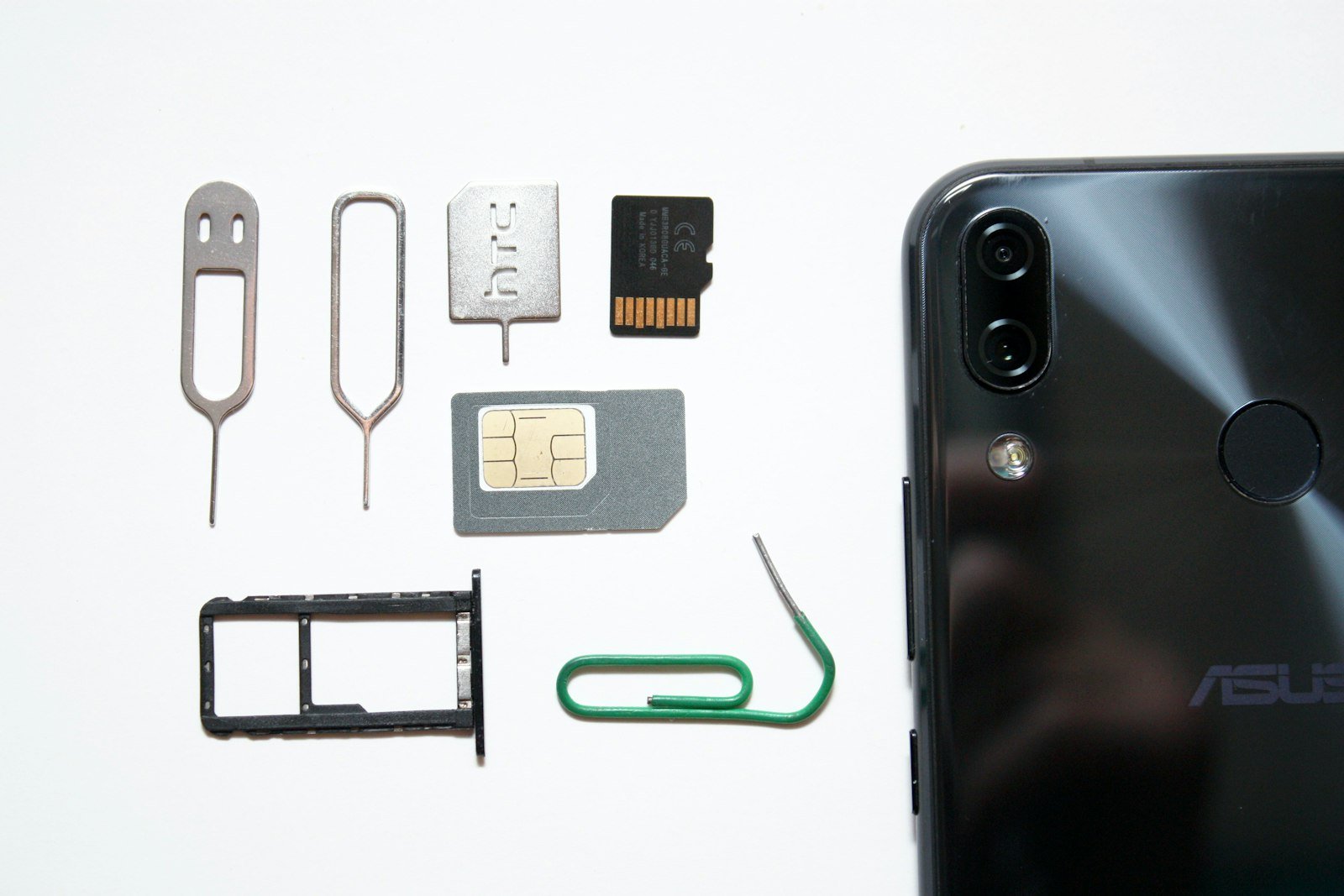 A cell phone with a SIM card attached to it